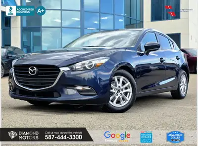 Just Arrived 2018 Mazda MAZDA3 i Touring AT 5-Door Blue has 102,283 KM on it. 2L 4 Cylinder Engine e...