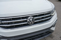 This Volkswagen Tiguan delivers a Intercooled Turbo Regular Unleaded I-4 2.0 L/121 engine powering t... (image 8)