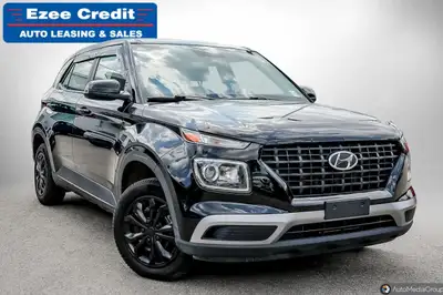 Introducing the 2022 Hyundai Venue Essential in striking black—a compact SUV that combines style, ef...