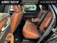 The 2023 Cadillac XT5 AWD Sport in a sleek black exterior blends luxury and performance with all-whe... (image 6)