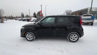 This Kia Soul is equipped with: Cloth Seating Surfaces, Heated front seats, Heated Steering Wheel, R... (image 5)