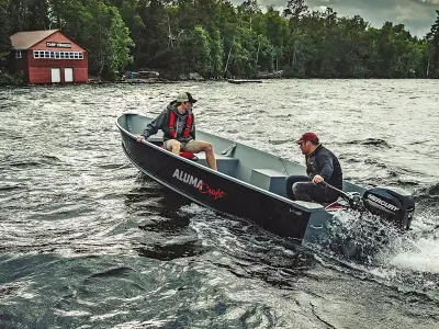 This V14 is BLACK in color and NO FLOOR. It comes with a trailer and a 20HP Mercury Tiller. This is...