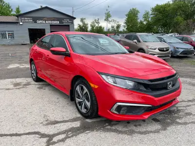 The 2021 Honda Civic LX is a sleek, fuel-efficient, and reliable compact sedanperfect for daily driv...