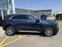 Finished in Twilight Blue Metallic and riding on stylish 18-inch aluminum wheels, this 2021 Cadillac... (image 8)