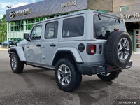 This 2023 Jeep Wrangler Sahara, a head-turner in Silver Zynith, offers both rugged capability and re... (image 2)