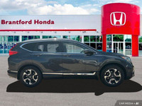 This 2018 Honda CR-V Touring offers a compelling blend of comfort, technology, and all-wheel-drive c... (image 6)