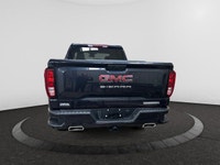 This 2025 GMC Sierra 1500 in Titanium Rush Metallic is equipped with 4WD and Turbocharged Diesel I6... (image 3)