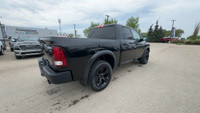 This Ram 1500 Classic is equipped with: Premium Cloth Bucket Seats, Remote Start, Front Heated Seats... (image 1)