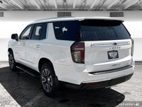 The 2022 Chevy Tahoe 4WD includes leather seating, heated front seats, heated mirrors, and tri-zone... (image 3)