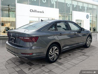 This Volkswagen Jetta boasts a Intercooled Turbo Regular Unleaded I-4 1.4 L/85 engine powering this... (image 4)