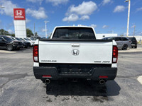 Experience the versatility of this 2022 Honda Ridgeline Touring Crew Cab Pickup, boasting a robust a... (image 5)