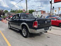 2014 Ram 1500 4WD Crew Cab Laramie Loaded with luxury and power, this full-size pickup features prem... (image 7)