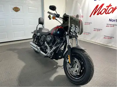 Canadian Harley at True North Motor sports has just 15,644 km. Black Denim Dyna is powered by High O...