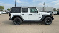 This 2025 JEEP WRANGLER 4-DOOR SPORT has the following options Cloth Low-Back Bucket Seats, Uconnect... (image 9)