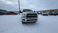 This Ram 2500 is equipped with: Cloth Front 40/20/40 Bench Seat, Radio: Uconnect 5 w/8.4 Display, 4G... (image 3)