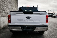 This 2021 Ford F-150 is for sale today. This Crew Cab 4X4 pickup has 110,911 kms. It's white in colo... (image 4)