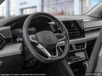 This Volkswagen Taos boasts a Intercooled Turbo Regular Unleaded I-4 1.5 L/91 engine powering this A... (image 9)