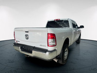 The 2020 Ram 2500 Big Horn in a classic white exterior and rugged 4x4 drivetrain promises unparallel... (image 8)