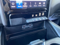 The 2023 Ram 1500 Sport in Granite Crystal Metallic boasts a bold and rugged presence, complemented... (image 8)
