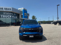 The 2023 Chevrolet Colorado 4WD LT Crew Cab in a striking blue finish offers impeccable handling wit... (image 5)