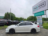 2014 Subaru WRX STI with the 6-speed manual and only 116,000kms! Vehicle comes safety certified! Two... (image 7)