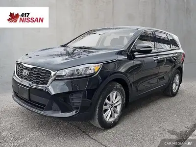 Discover spacious versatility and practicality in this 2019 Kia Sorento LX, a capable SUV ready for...