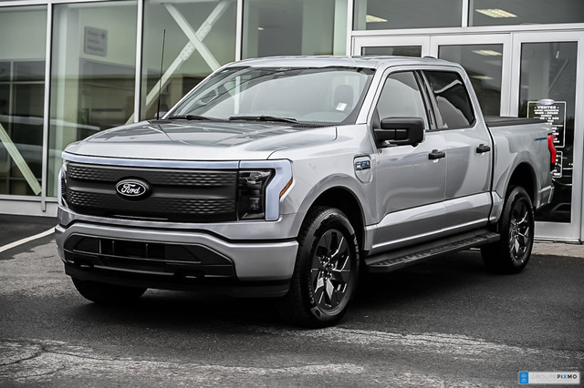 2024 Ford F-150 Lightning 4x4 SuperCrew XLT - 145 WB TAUX D'INTE in Cars & Trucks in Longueuil / South Shore