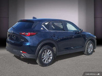 Le Mazda CX-5 GS 2025 poursuit la tradition d'élégance et de performance propre à la marque japonais... (image 6)