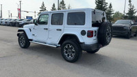 This 2025 JEEP WRANGLER 4-DOOR SAHARA has the following options Cloth Low-Back Bucket Seats, Remote... (image 6)