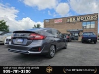 No accident, One Owner Ontario vehicle with Lot of Options! Call (905) 791-3300 - Grey Fabric interi... (image 5)