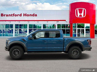 Dominate any terrain with this stunning 2019 Ford F-150 Raptor. This head-turning Blue Crew Cab boas... (image 1)