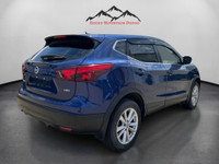 WAS: $22172 NOW: $21563 plus taxes and licensing feesExperience the beautiful blue Nissan Qashqai AW... (image 4)
