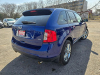 VERY WELL DRIVING SHARP LOOKING IMPACT BLUE ON BLACK FORD SPORT UTILITY VEHICLE W/ GOOD MILEAGE, EQU... (image 4)