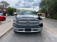 2014 Ram 1500 4WD Crew Cab Laramie Loaded with luxury and power, this full-size pickup features prem... (image 1)