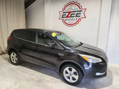 All wheel drive 15 Escape SE with backup camera, bluetooth and more. 1.6 liter turbocharged engine....
