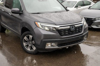 This 2019 Honda Ridgeline Touring brings together rugged capability, refined comfort, and advanced t... (image 6)