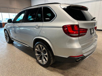 Our 2015 BMW X5 xDrive35i gives you the comfort of an SUV and the spirit of a sports car in Silver M... (image 2)