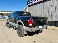 This 2014 Ram 1500 Laramie isnt just a truckits a fully loaded, diesel-powered workhorse with all th... (image 5)