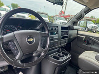 Need a reliable workhorse for your business? This 2023 Chevrolet Express Cargo Van, boasting a low 9... (image 9)