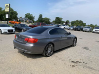 Looking for a thrilling driving experience? Feast your eyes on this sleek 2011 BMW 3 Series 335i xDr... (image 4)