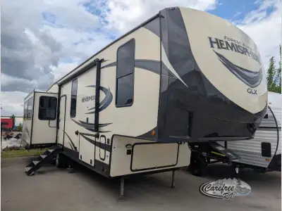 Forest River Salem Hemisphere GLX fifth wheel 338BAR highlights: Theater Seats Free Standing Dinette...