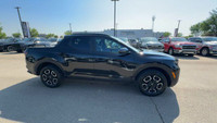 This Hyundai Santa Cruz is equipped with: Cloth Seat Trim, Heated front seats, Heated Steering Wheel... (image 9)