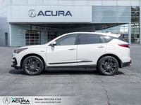 CLEAN CARFAX, LOW KM Glazed in a White Diamond Pearl exterior that is completed with Red leather w/... (image 2)