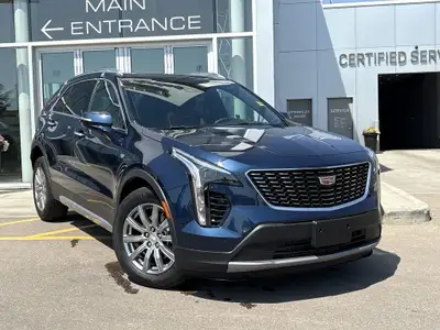 Finished in Twilight Blue Metallic and riding on stylish 18-inch aluminum wheels, this 2021 Cadillac...