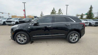 This Cadillac XT5 is equipped with: Leather Seating Surfaces w/Mini Perforated Inserts, Power moonro... (image 7)