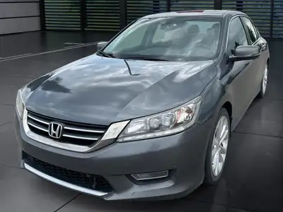 A rare and engaging manual transmission sedan offering comfort and performance. The Touring trim inc...