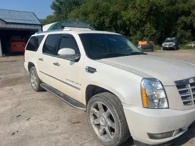 This item sells online at Grunthal Auction Service. Lot 23 clean title, 7 seater 6.2 litre v8. Lots...