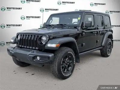 The 2021 Jeep Wrangler Unlimited Willys 4x4 is a rugged and capable off-roading icon, ready for adve...