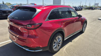 The 2024 Mazda CX-90 GT is a premium, three-row SUV that combines dynamic driving performance with u... (image 4)