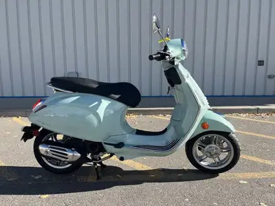 NEW REDESIGNED VESPA PRIMAVERA 50 NOW IN STOCK! AND IN THE POPULAR GREEN! CALL OR TEXT 403-230-1920...